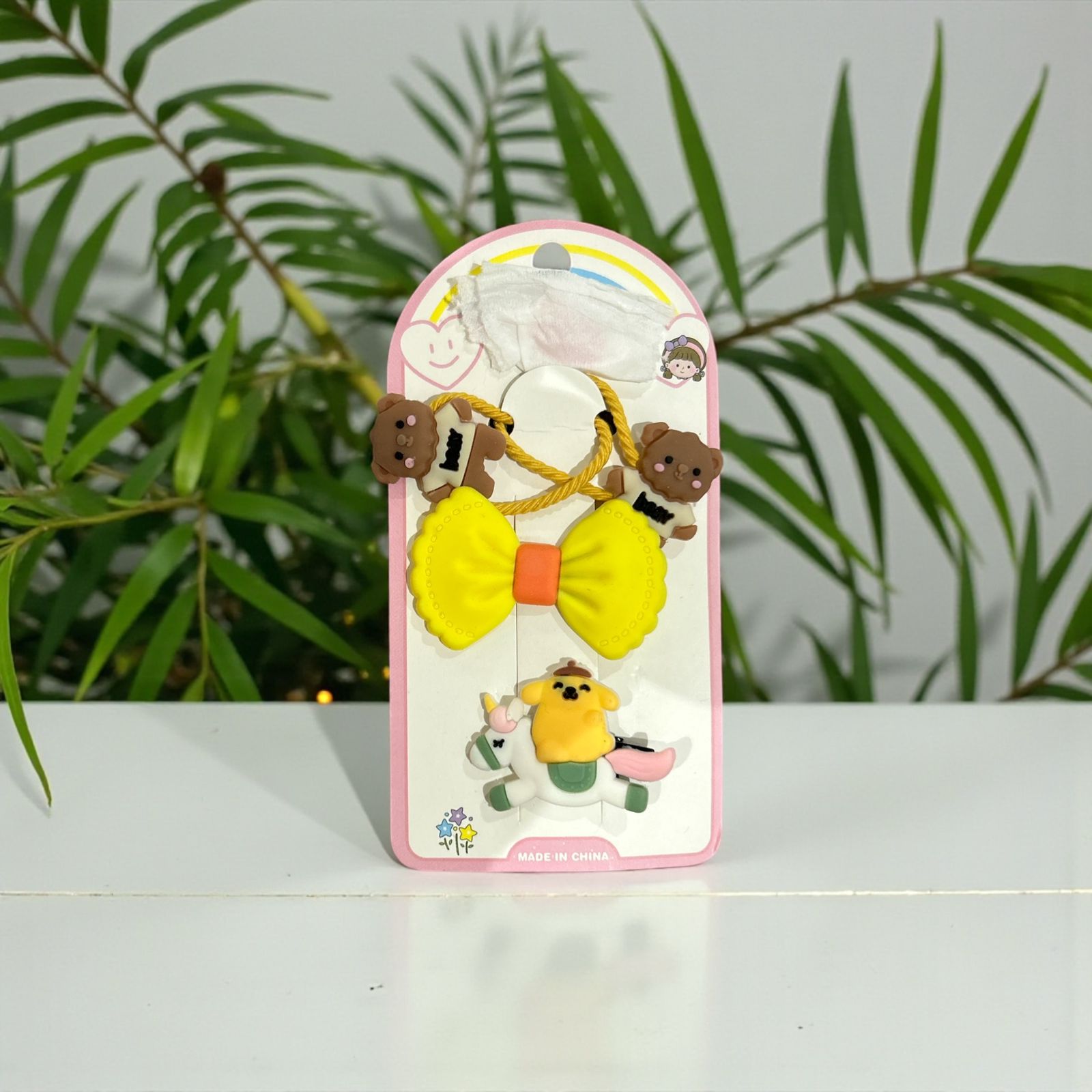 A yellow tiny hair bands