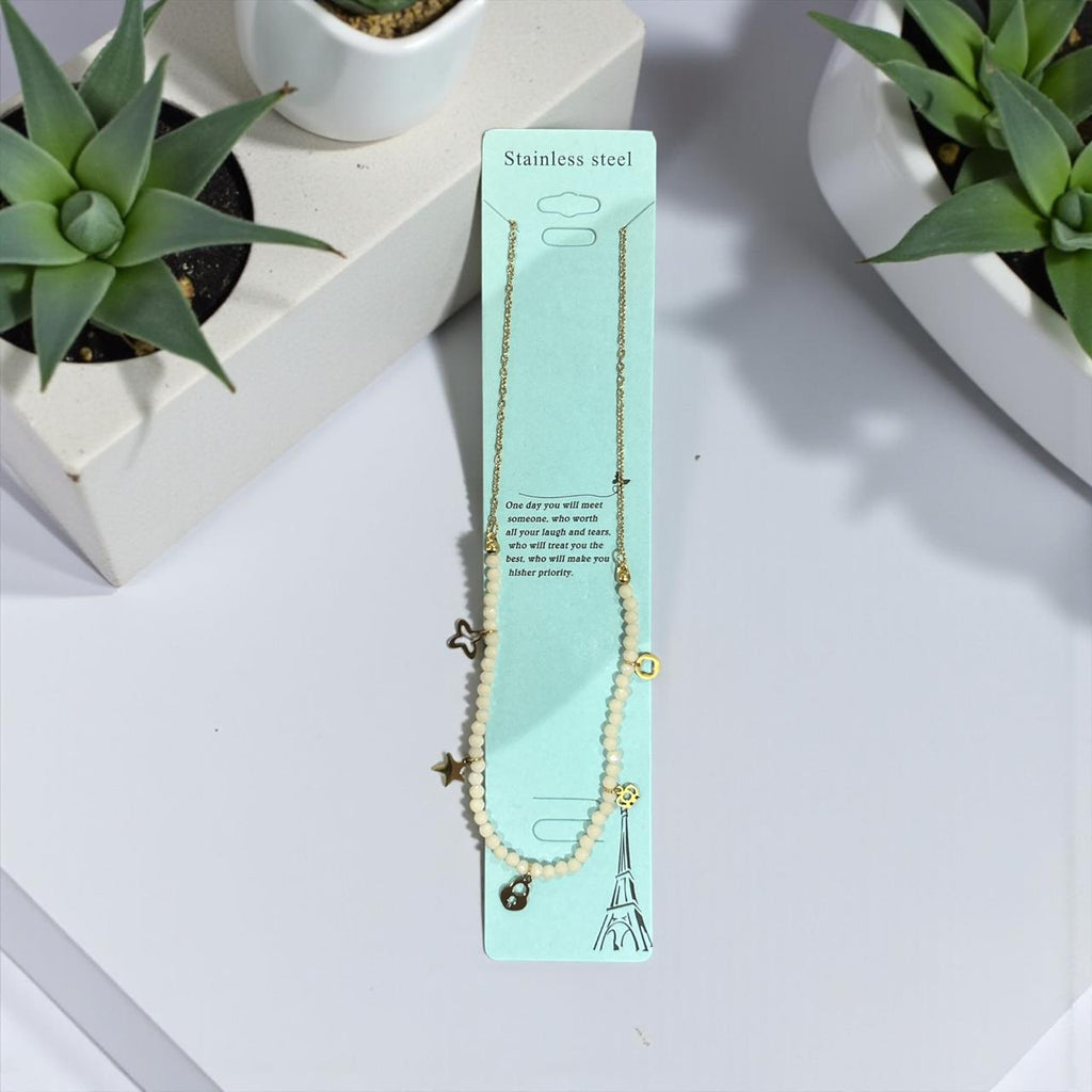 gold necklace with elegant charms