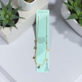 gold necklace with elegant charms