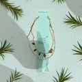 Gold necklace with hand palm charms