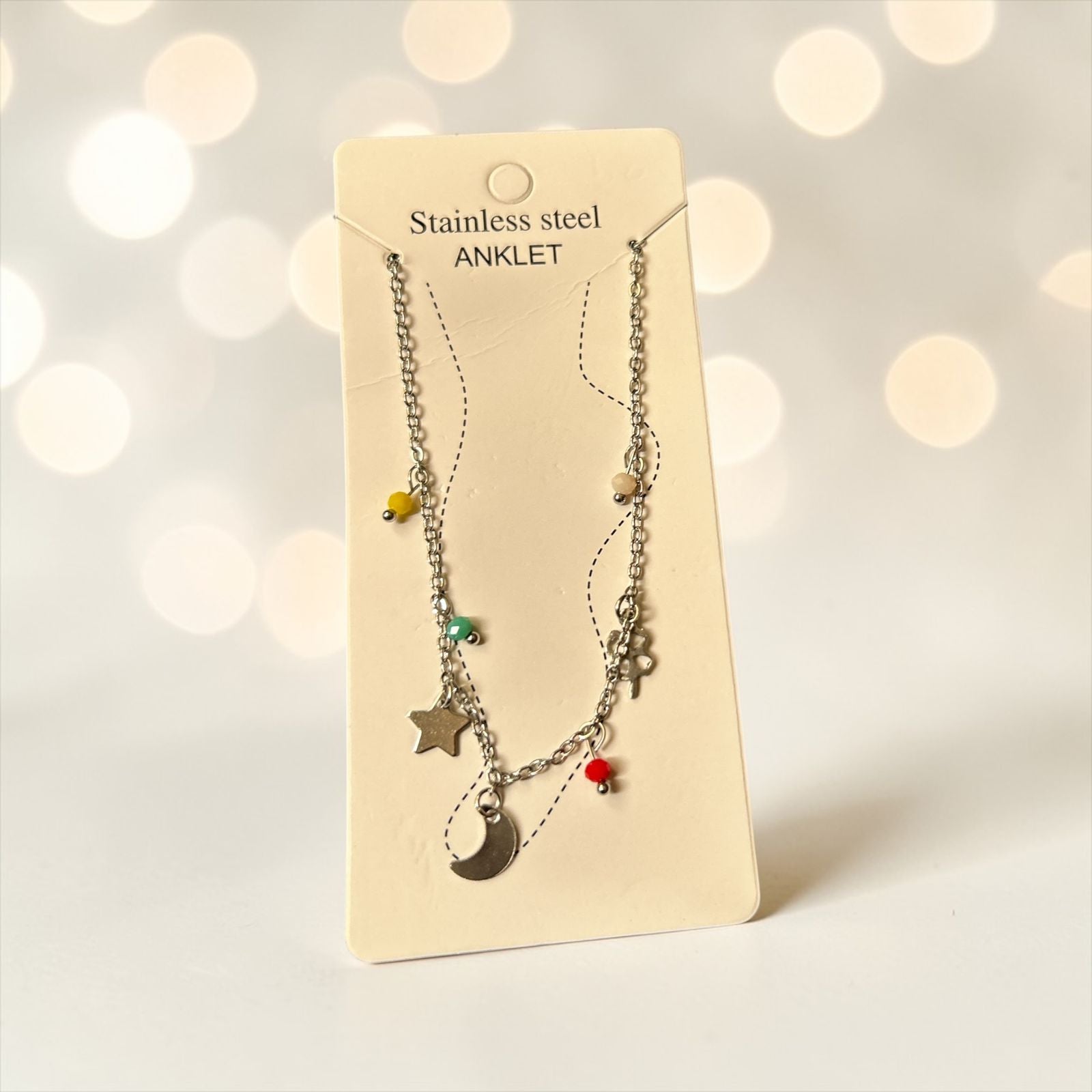 silver anklet with star and crescent charm