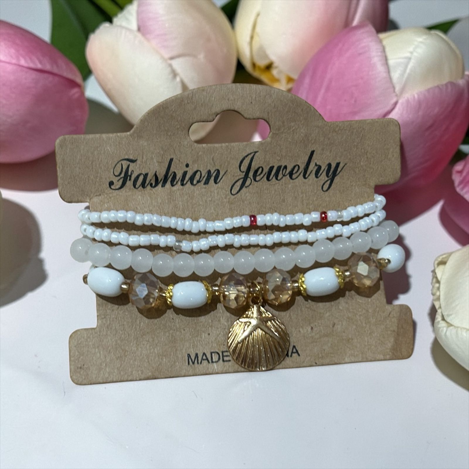 set of white bracelets