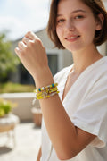 set of yellow bracelets