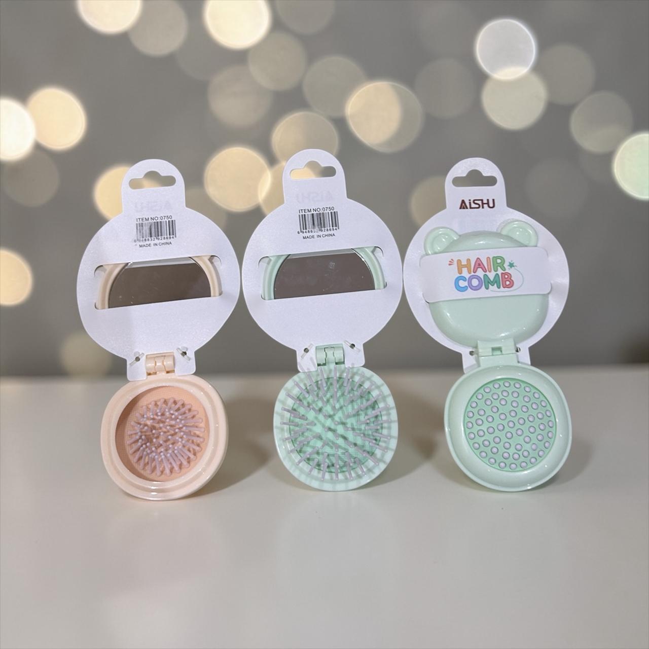 Folding hair comb with mirror