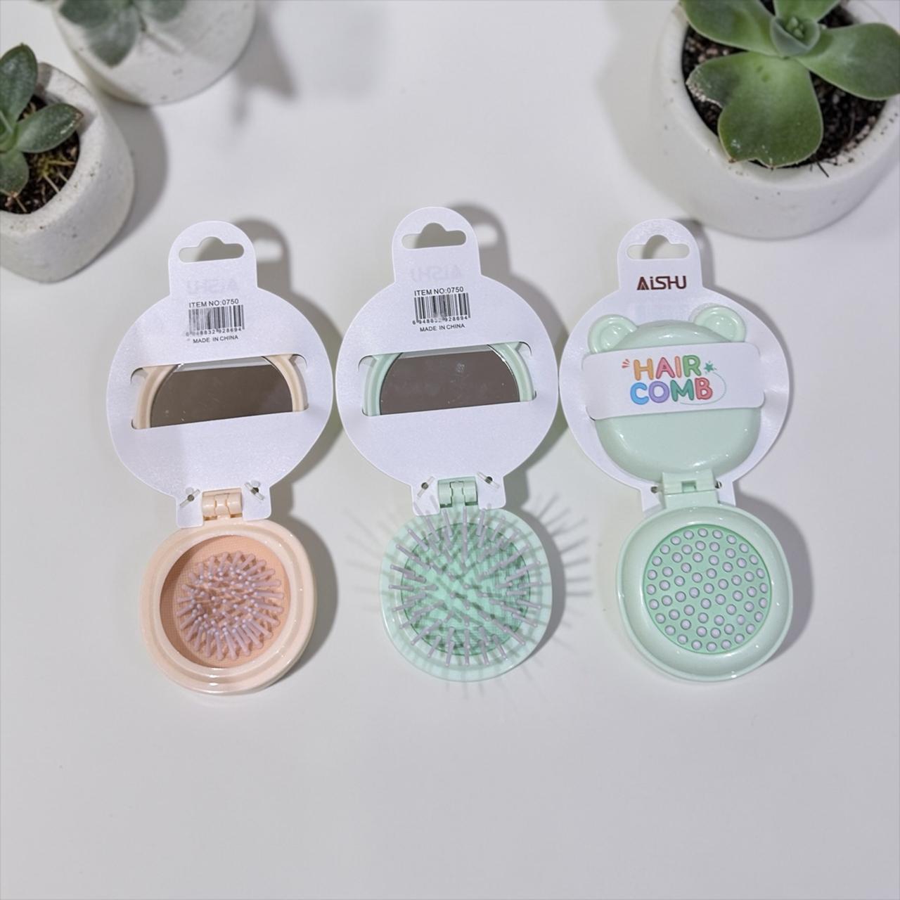 Folding hair comb with mirror