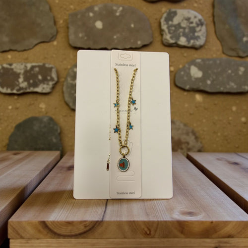 A blue necklace with stars charms