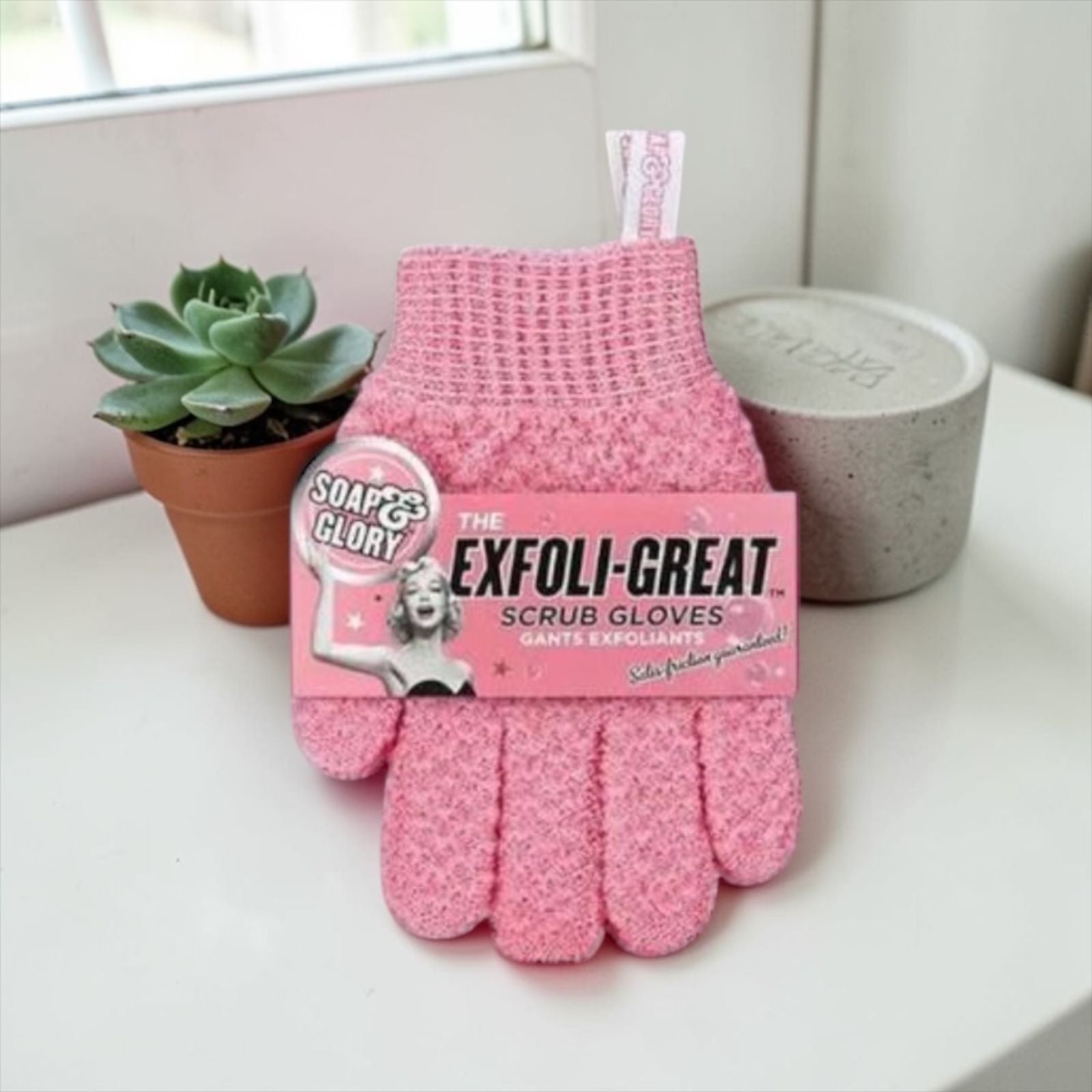 Exfoliating scrub pink gloves