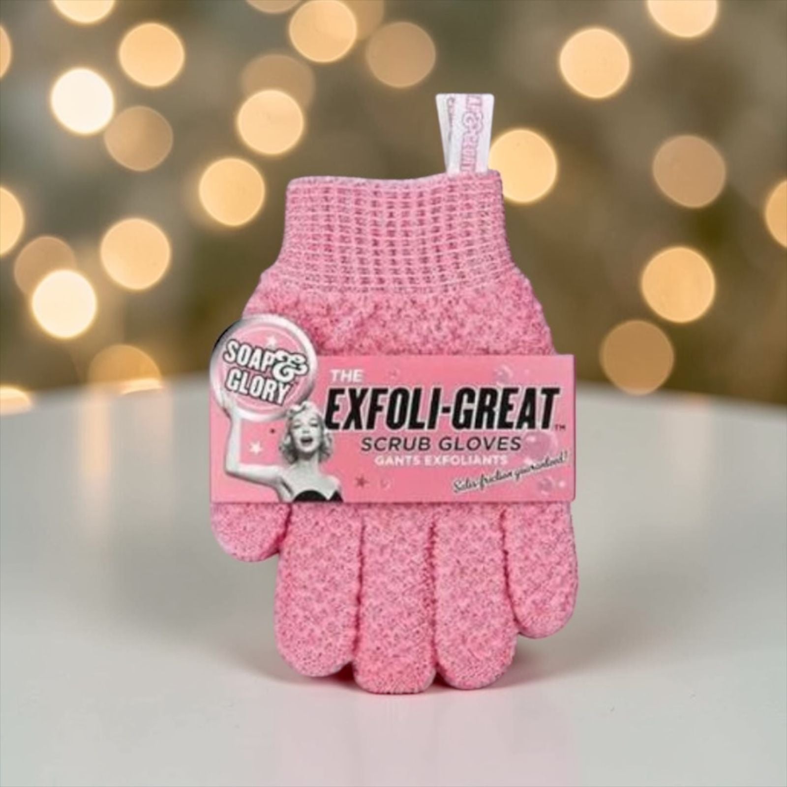 Exfoliating scrub pink gloves