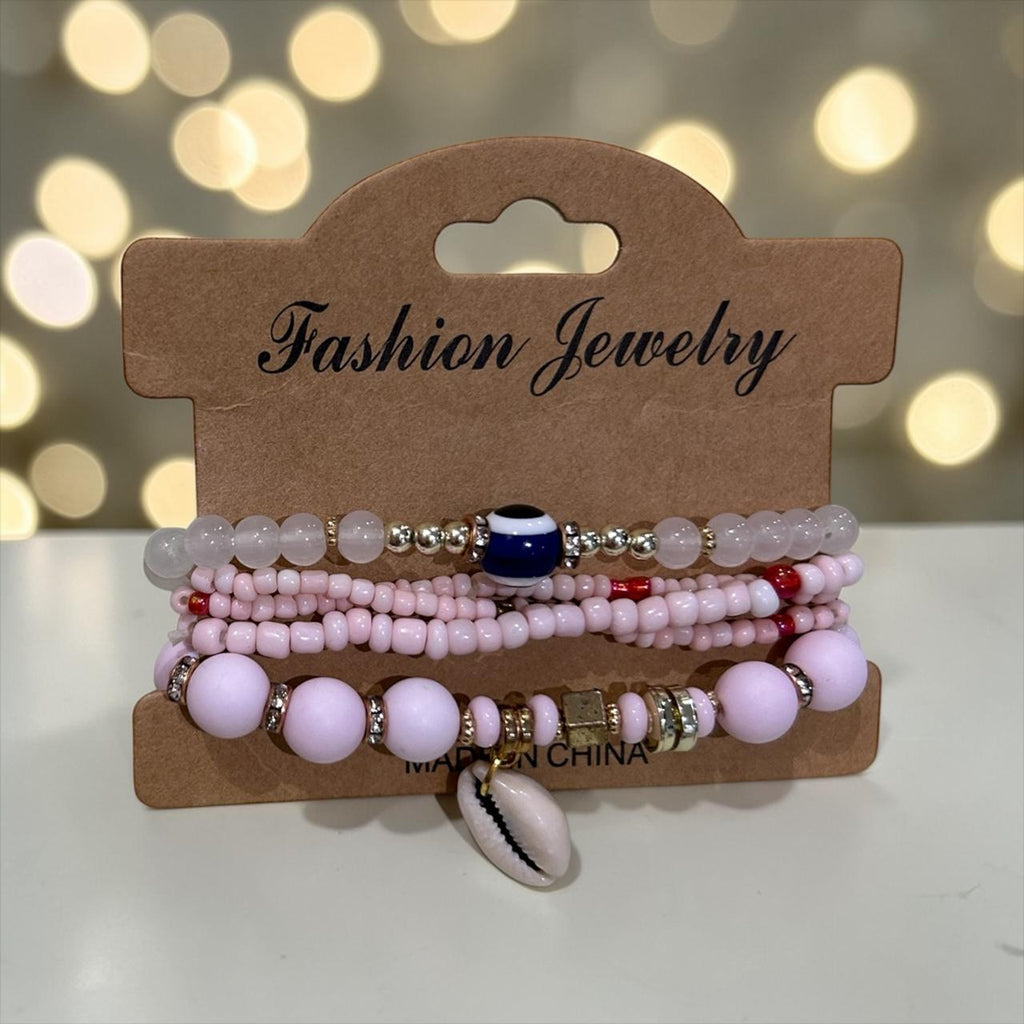 set of pink bracelets