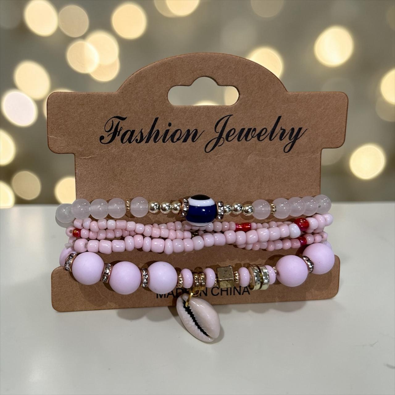 set of pink bracelets