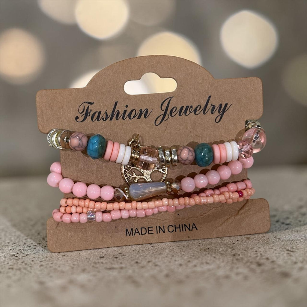 set of pink bracelets