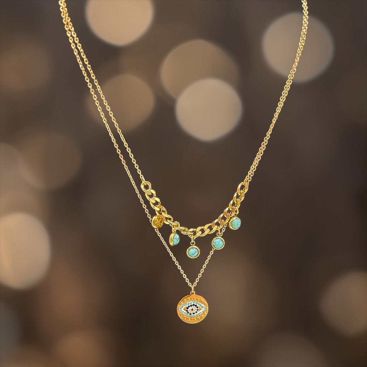 Gold necklace with eye charm