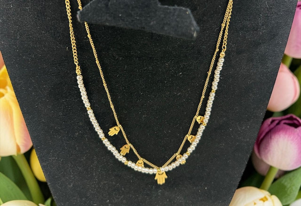 Gold necklace with hand palm charms