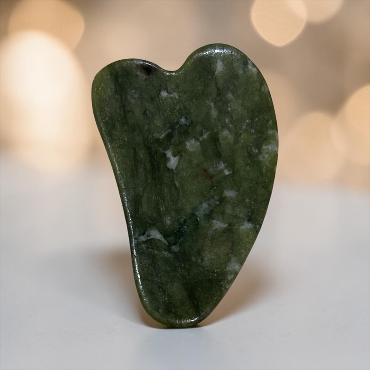 Gua cha stone for facial massage and muscle relaxation