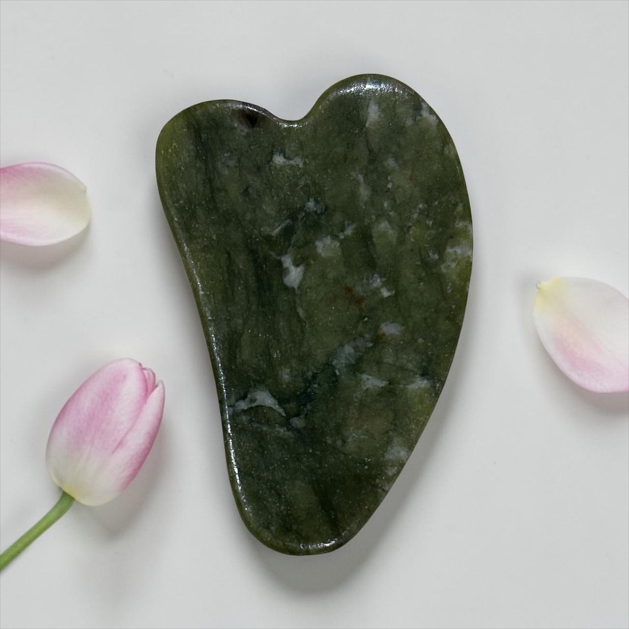 Gua cha stone for facial massage and muscle relaxation